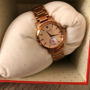 Rose gold watch gently used